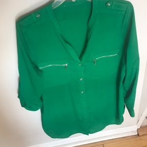 Green blouse. Silver zipper pockets, do not zip.
